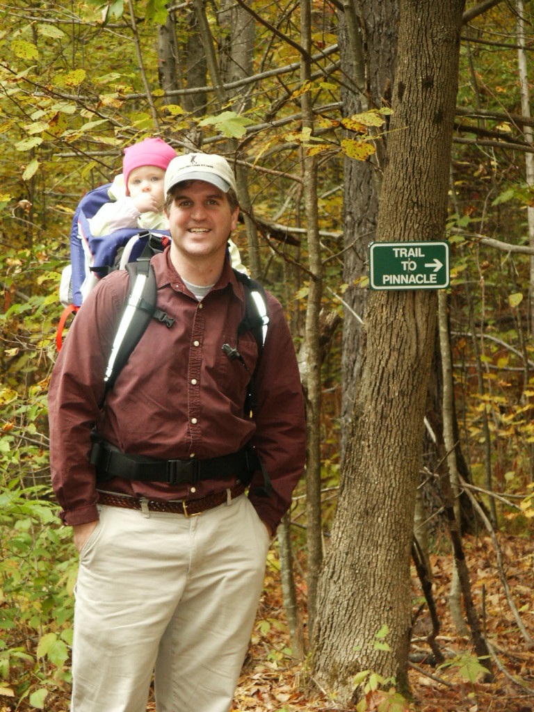 James Thaxton and trail sign